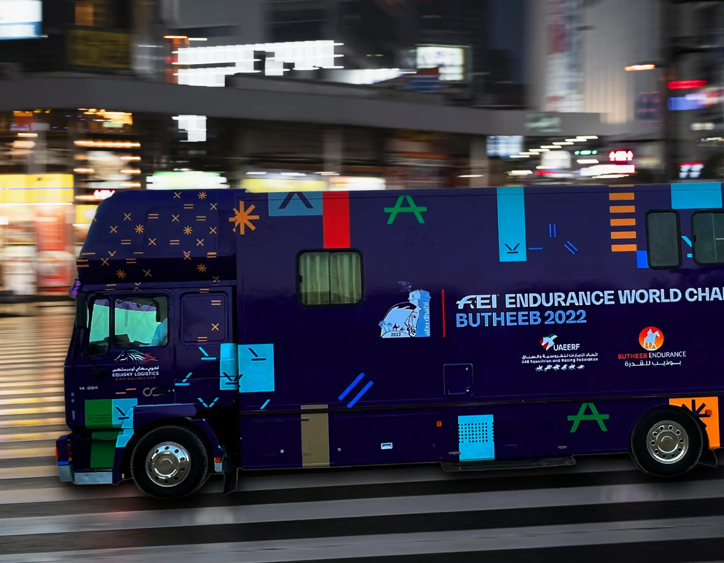A bus utilising vehicle branding in Dubai.